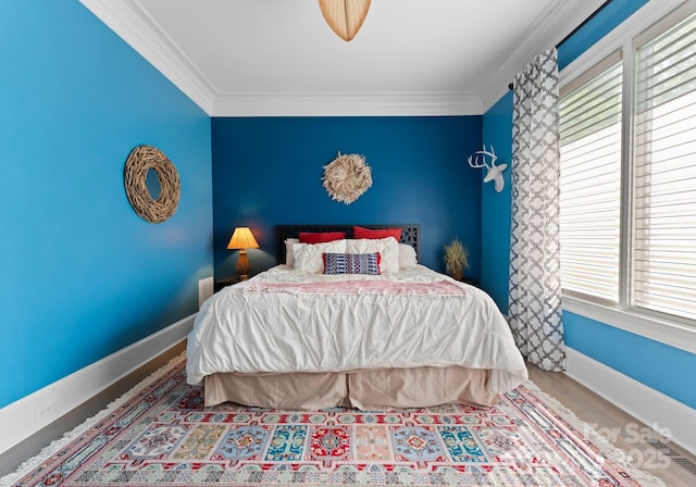 2915 Cutter Ct, Waxhaw, NC 28173 - bedroom featuring ornamental molding, baseboards, and wood finished floors
