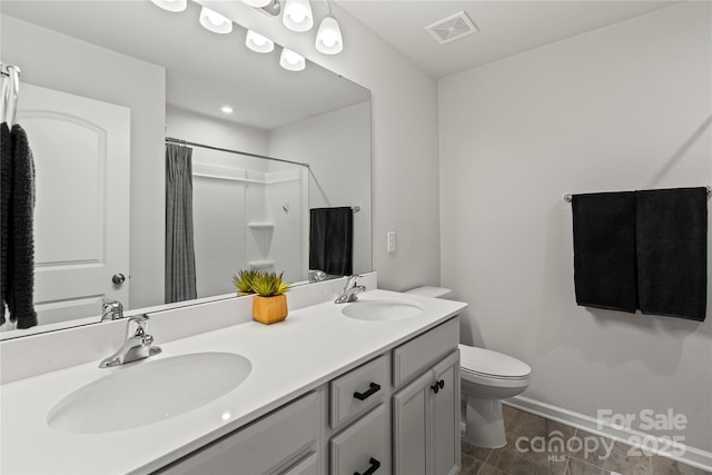 15622 Little Bluestem St, Charlotte, NC 28278 - bathroom with toilet, double vanity, a shower with shower curtain, and baseboards