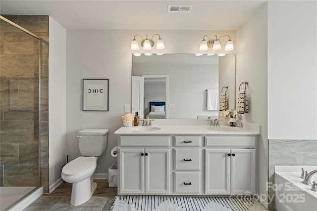 15622 Little Bluestem St, Charlotte, NC 28278 - ensuite bathroom featuring a shower stall, double vanity, toilet, and a bath