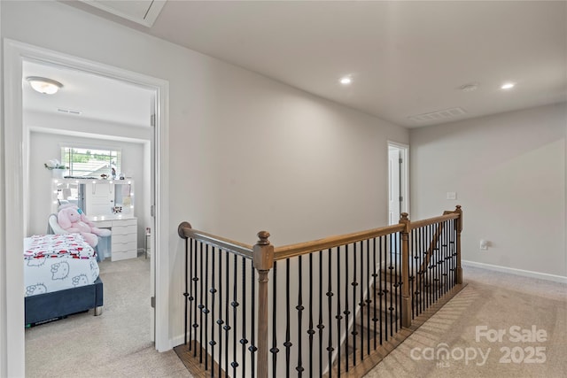 15622 Little Bluestem St, Charlotte, NC 28278 - hallway with carpet floors, an upstairs landing, recessed lighting, and baseboards