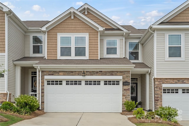 15622 Little Bluestem St, Charlotte, NC 28278 - multi unit property featuring driveway, a garage, stone siding, and a shingled roof