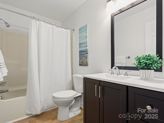 full bathroom with toilet, vanity, shower / tub combo, and wood finished floors