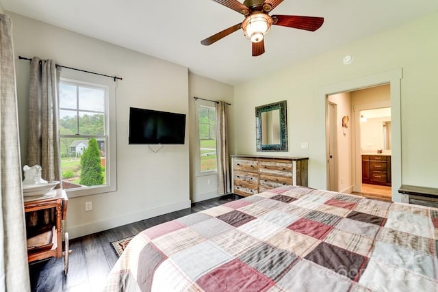 bedroom featuring baseboards, ceiling fan, and wood finished floors