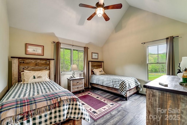 bedroom featuring high vaulted ceiling, ceiling fan, and wood finished floors