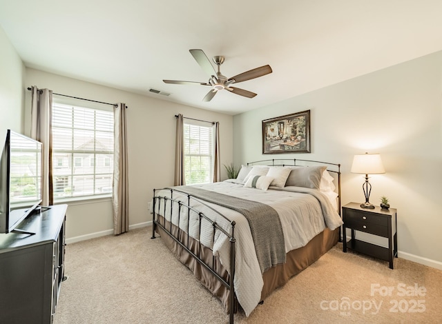 16507 Palisades Commons Dr, Charlotte, NC 28278 - bedroom with light carpet, baseboards, and a ceiling fan