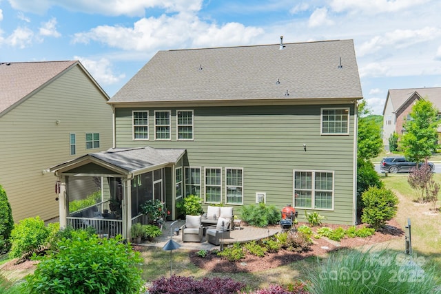 16507 Palisades Commons Dr, Charlotte, NC 28278 - rear view of property featuring a sunroom, outdoor lounge area, a patio, and a shingled roof