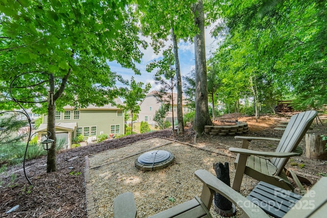16507 Palisades Commons Dr, Charlotte, NC 28278 - view of patio featuring an outdoor fire pit