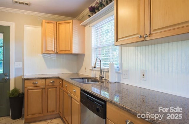 kitchen with dark stone counters, a sink, crown molding, visible vents, and dishwasher