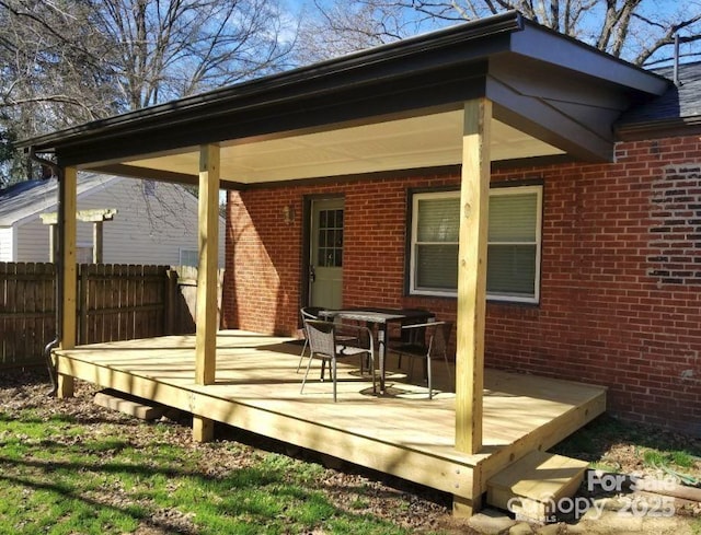 deck featuring fence