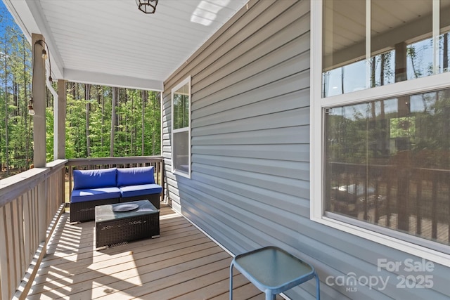 deck featuring an outdoor hangout area
