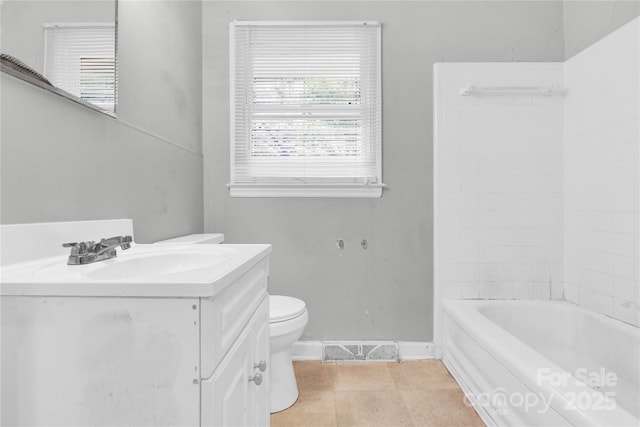 bathroom with tile patterned flooring, visible vents, vanity, toilet, and baseboards