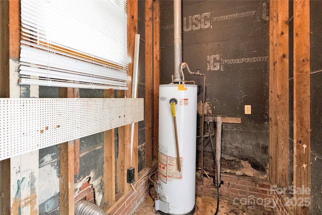utility room featuring gas water heater