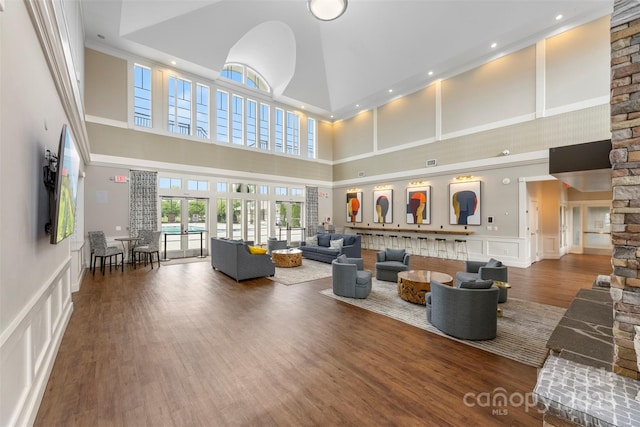 2151 Belle Vernon Ave, Charlotte, NC 28210 - common area with a decorative wall, a towering ceiling, and wainscoting