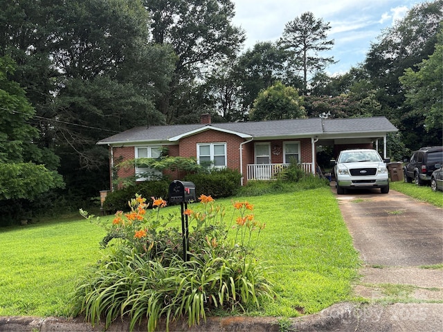 910 Mcgowan Rd, Shelby, NC 28150 - single story home featuring brick siding, a front lawn, and an attached carport