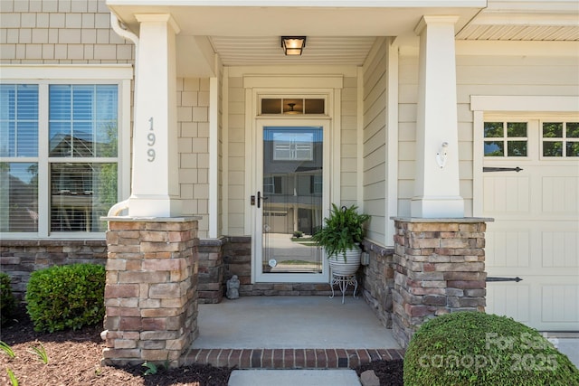 199 Blossom Ridge Dr, Mooresville, NC 28117 - entrance to property featuring covered porch and stone siding