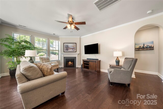 199 Blossom Ridge Dr, Mooresville, NC 28117 - living room with ceiling fan, visible vents, arched walkways, wood finished floors, and baseboards