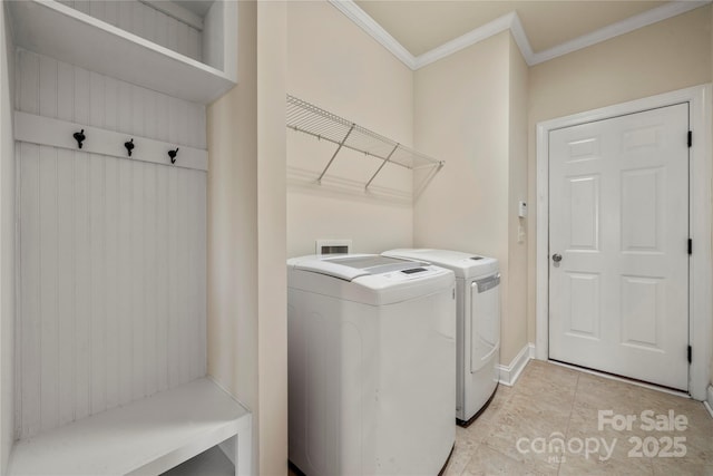 199 Blossom Ridge Dr, Mooresville, NC 28117 - washroom featuring baseboards, ornamental molding, laundry area, and washing machine and dryer