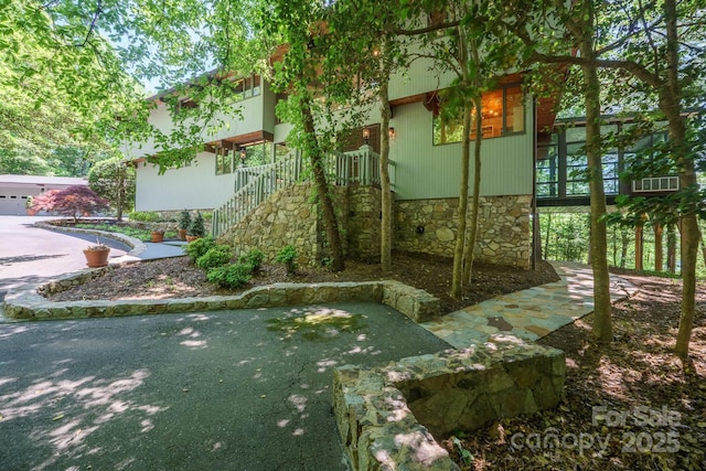 view of yard featuring stairway