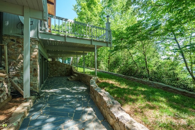 view of yard with a deck