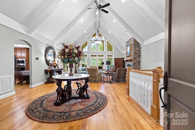 206 Stone Valley Way Unit 23, Hendersonville, NC 28792 - entryway with arched walkways, a ceiling fan, light wood-style flooring, beam ceiling, and baseboards