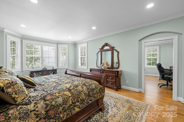 206 Stone Valley Way Unit 23, Hendersonville, NC 28792 - bedroom with crown molding, recessed lighting, light wood-type flooring, baseboards, and an office area