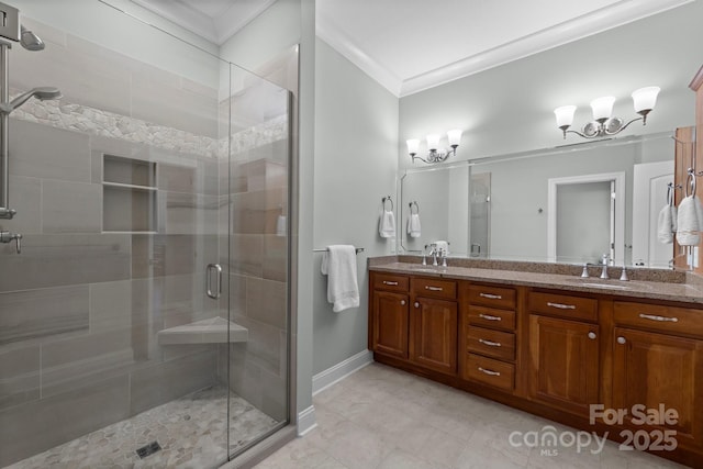 206 Stone Valley Way Unit 23, Hendersonville, NC 28792 - bathroom featuring crown molding, double vanity, a shower stall, and baseboards
