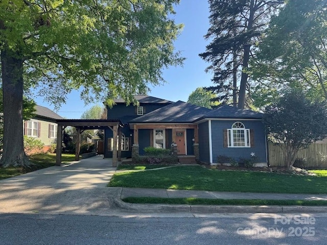 1019 Valley St, Kannapolis, NC 28081 - view of front of house with concrete driveway and a carport