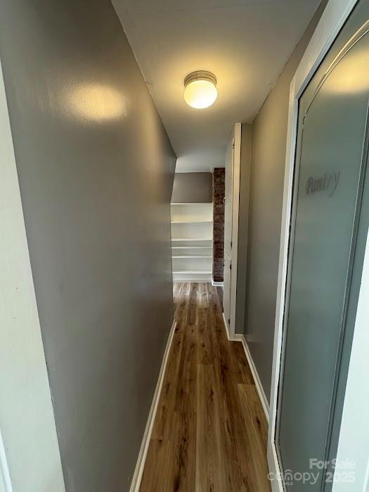 1019 Valley St, Kannapolis, NC 28081 - hallway with dark wood-style floors and baseboards