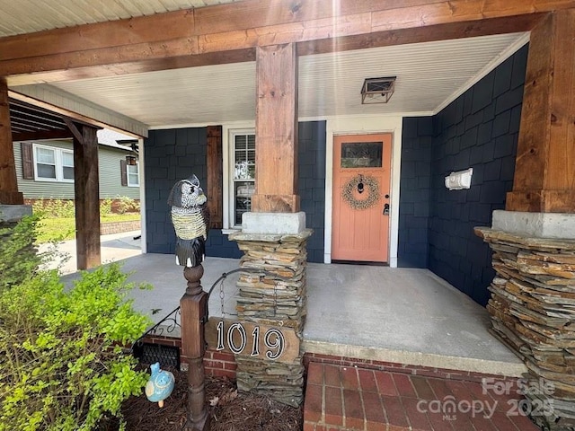 1019 Valley St, Kannapolis, NC 28081 - view of exterior entry with a porch