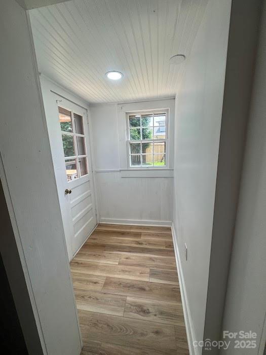1019 Valley St, Kannapolis, NC 28081 - spare room featuring wainscoting, wooden ceiling, and wood finished floors