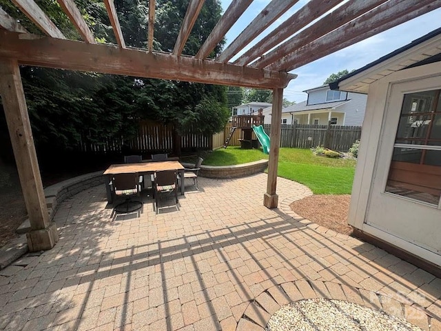 1019 Valley St, Kannapolis, NC 28081 - view of patio with a playground, outdoor dining area, and a pergola