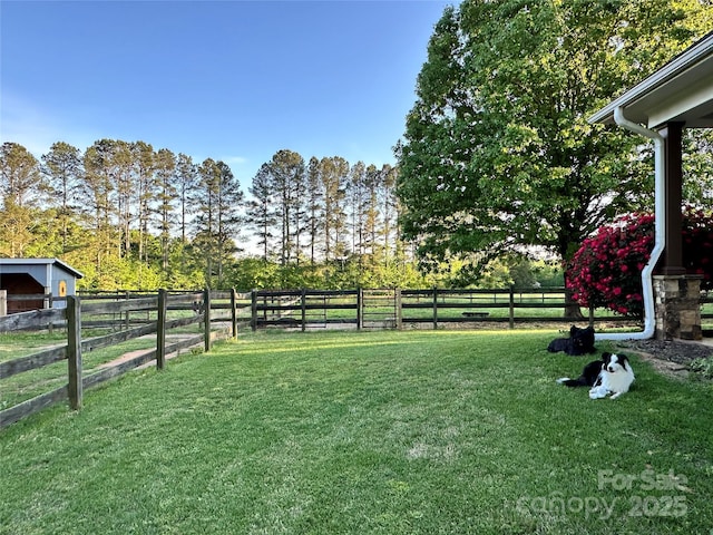 view of yard with fence
