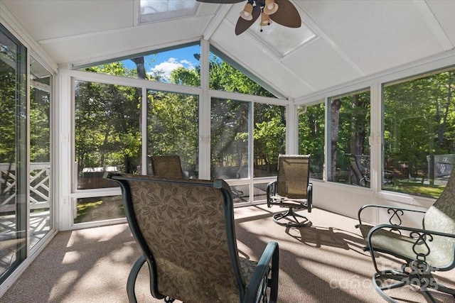 sunroom with a healthy amount of sunlight and ceiling fan