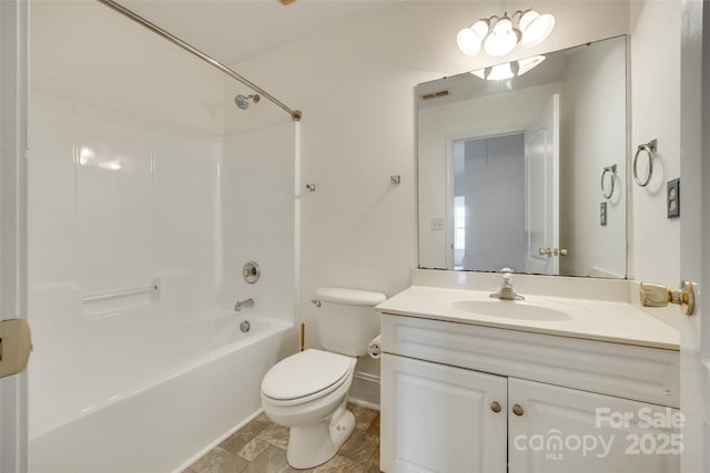 1835 Montague Rd, Clover, SC 29710 - bathroom featuring toilet, vanity, shower / bathtub combination, baseboards, and stone finish flooring