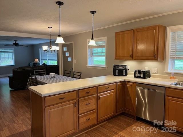 323 Hibriten Dr SE, Lenoir, NC 28645 - kitchen featuring light countertops, a peninsula, dark wood-style floors, and dishwasher