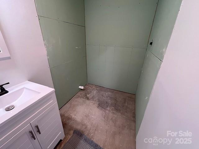 323 Hibriten Dr SE, Lenoir, NC 28645 - bathroom with vanity and unfinished concrete flooring
