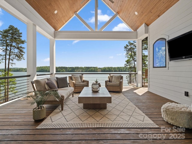 8044 Edgewater Dr Unit 100, Norwood, NC 28128 - wooden terrace featuring a water view, an outdoor living space, and a gazebo