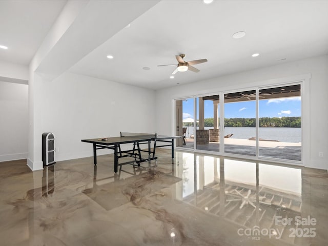 8044 Edgewater Dr Unit 100, Norwood, NC 28128 - recreation room featuring baseboards, a ceiling fan, recessed lighting, a water view, and finished concrete floors