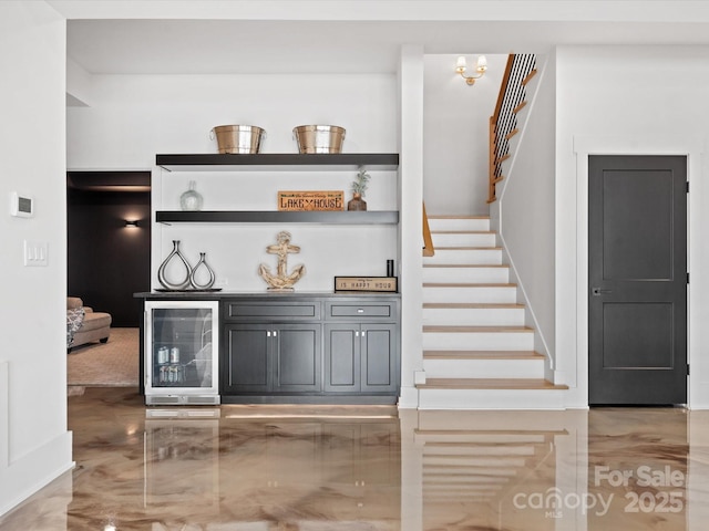 8044 Edgewater Dr Unit 100, Norwood, NC 28128 - staircase with wine cooler