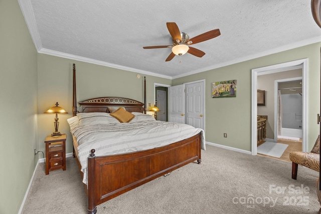 166 Kennedy Rd, Weaverville, NC 28787 - bedroom with light carpet, baseboards, a textured ceiling, crown molding, and connected bathroom