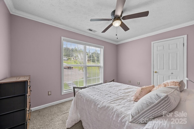 166 Kennedy Rd, Weaverville, NC 28787 - carpeted bedroom featuring crown molding, baseboards, a ceiling fan, and a textured ceiling