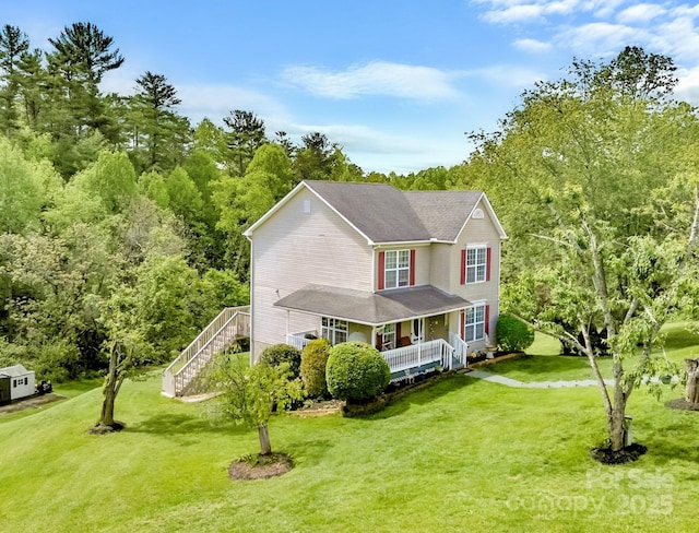 166 Kennedy Rd, Weaverville, NC 28787 - view of front of home featuring a porch, a front yard, and view of scattered trees