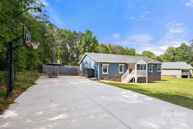 single story home with fence, a front yard, driveway, and crawl space