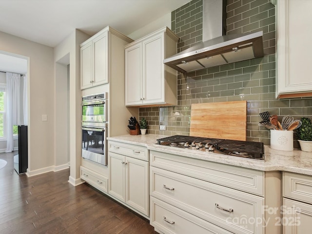 5420 Meadowcroft Way, Fort Mill, SC 29708 - kitchen with wall chimney exhaust hood, stainless steel appliances, decorative backsplash, baseboards, and dark wood-style flooring