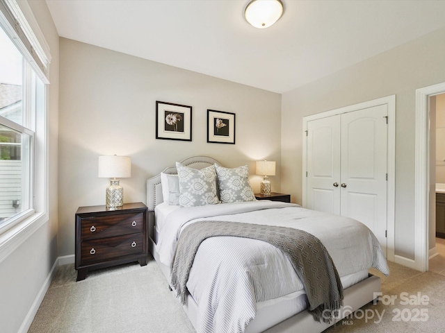 5420 Meadowcroft Way, Fort Mill, SC 29708 - bedroom featuring light carpet, a closet, and baseboards