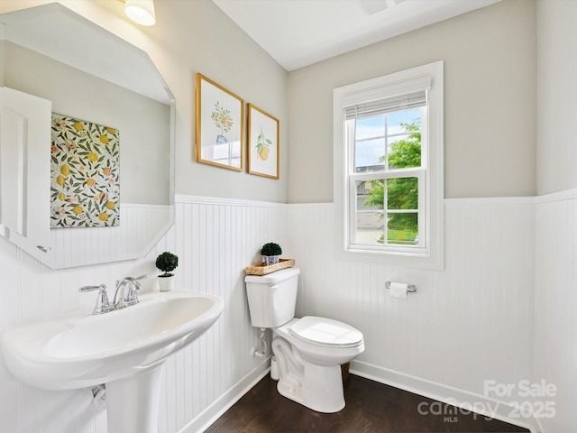 5420 Meadowcroft Way, Fort Mill, SC 29708 - bathroom featuring wainscoting, toilet, wood finished floors, and a sink