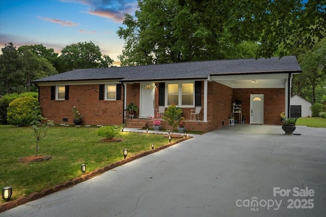 324 Autumn Dr, Harrisburg, NC 28075 - ranch-style home with brick siding, driveway, and a front yard