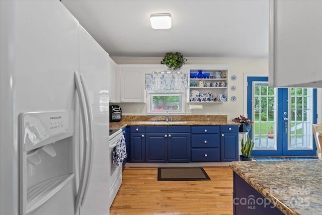 324 Autumn Dr, Harrisburg, NC 28075 - kitchen with a sink, blue cabinets, ornamental molding, french doors, and white appliances