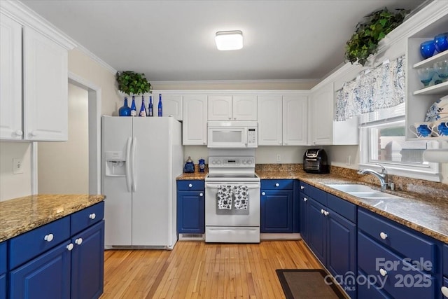 324 Autumn Dr, Harrisburg, NC 28075 - kitchen with blue cabinetry, white appliances, white cabinetry, and a sink