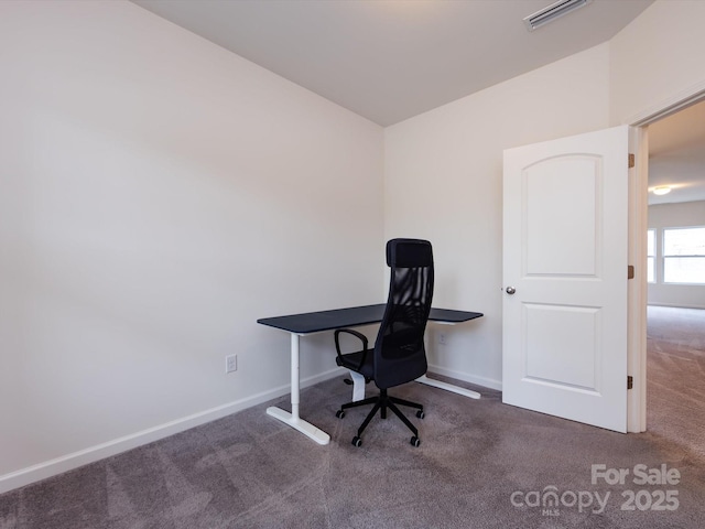 home office with baseboards, visible vents, and carpet floors